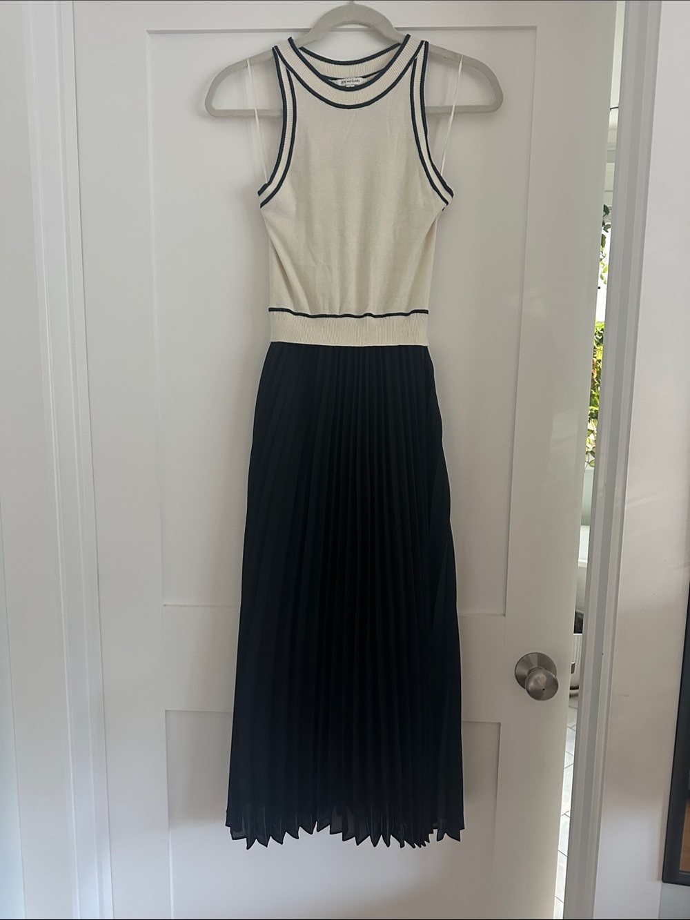 Zoe and Claire Sleeveless Cream Knit Black Pleated Dress